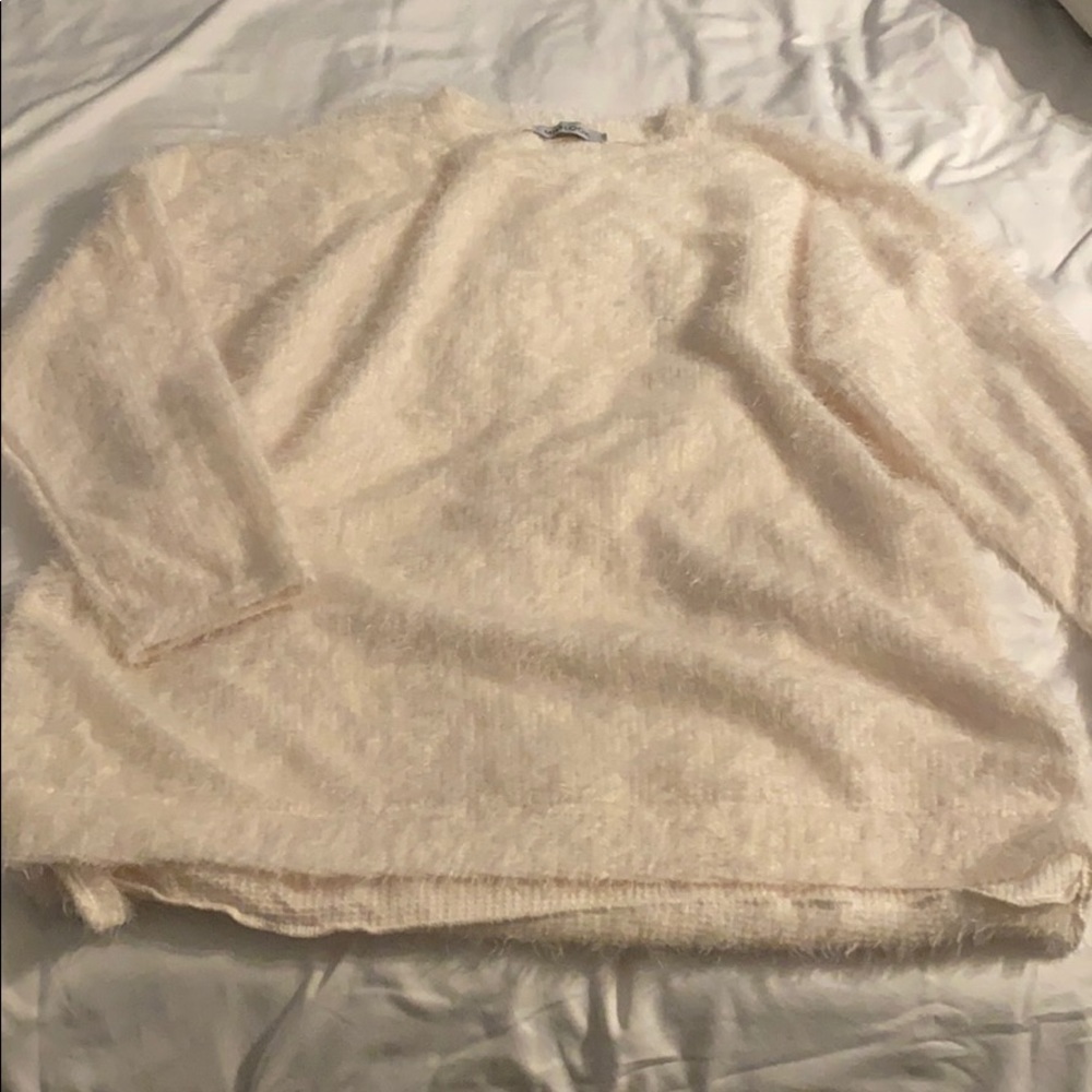 Fuzzy, cream sweater